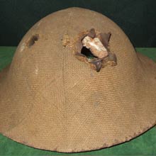 WW1 helmet with bullet hole