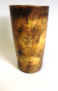 Engraved drinking beaker