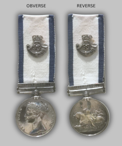 Obverse and reverse of the Museum's Royal Naval General Service Medal, awarded to Private (Rifleman) J. Steff (or Stiff)