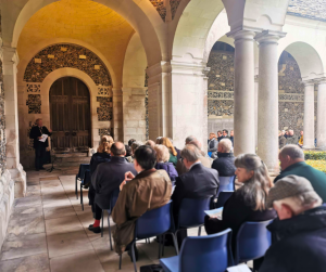 Christopher Normand, Director of the Winchester College Society, delivering the evening talk in War Cloister.